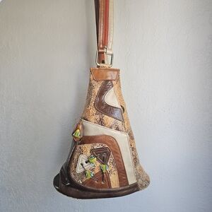 Cirque Du Soleil Backpack Swing Bag In Brown Tan And Orange